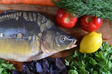 Рыба свежая с овощами и зеленью