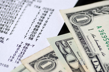 American dollars and receipt closeup