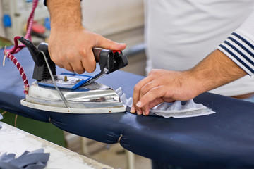 Tailor working in the sewing workshop