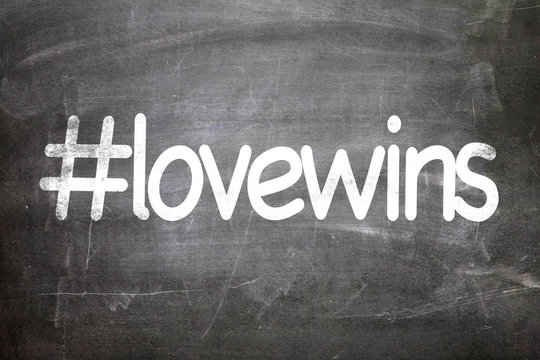#lovewins written on a chalkboard