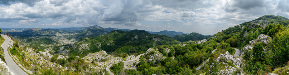 Fototapeta na wymiar Mountain panoramic landscape and road in summer. Montenegro, Europe.