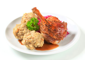 Roast duck with Tyrolean dumplings and red cabbage
