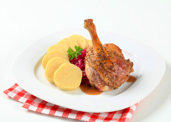 Roast duck with potato dumplings and red cabbage
