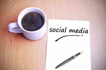 Coffee on the table with note writing social media