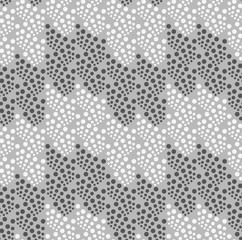 Monochrome pattern with light and dark gray dot clusters on gray