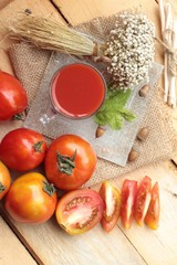 Tomato juice and fresh tomatoes