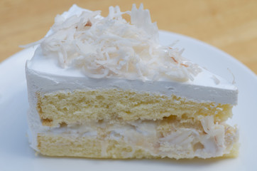 Coconut cake on white plate