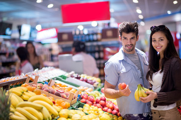 couple shopping in a supermarket