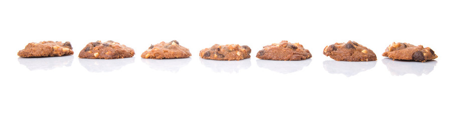 Homemade chocolate chip cookies over white background