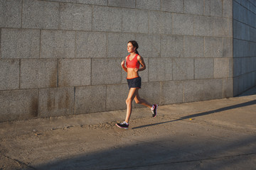 Fototapeta premium woman working out in an urban setting