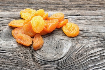 dried Turkish apricots on wooden table