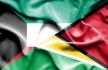 Waving flag of Guyana and Kuwait