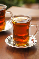 Two cups of turkish tea on a table in Istanbul