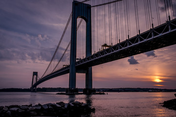 The bridge connecting Brooklyn to Staten Island named Verrazano bridge seen at dusk