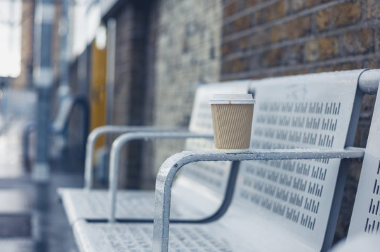 Paper cup on bench
