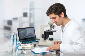 Male scientist or tech with dark hair and brown eyes works in sc