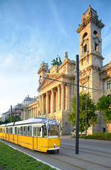 Fototapeta na wymiar Historical tram passes Museum of Ethnography in Budapest