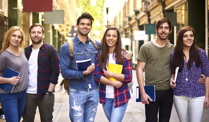 Three couples walking after school