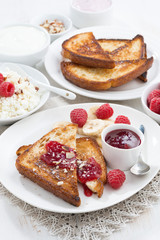 sweet breakfast - crispy toasts with fresh raspberries, banana 