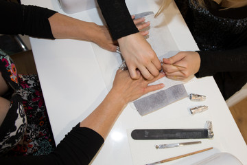 Manicure process in a beauty salon, a closeup