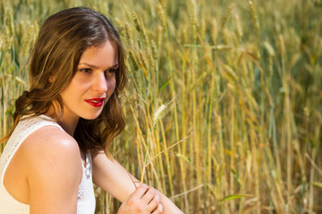 Fototapeta premium Happy girl in the summer field