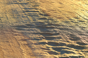 golden background uneven pits