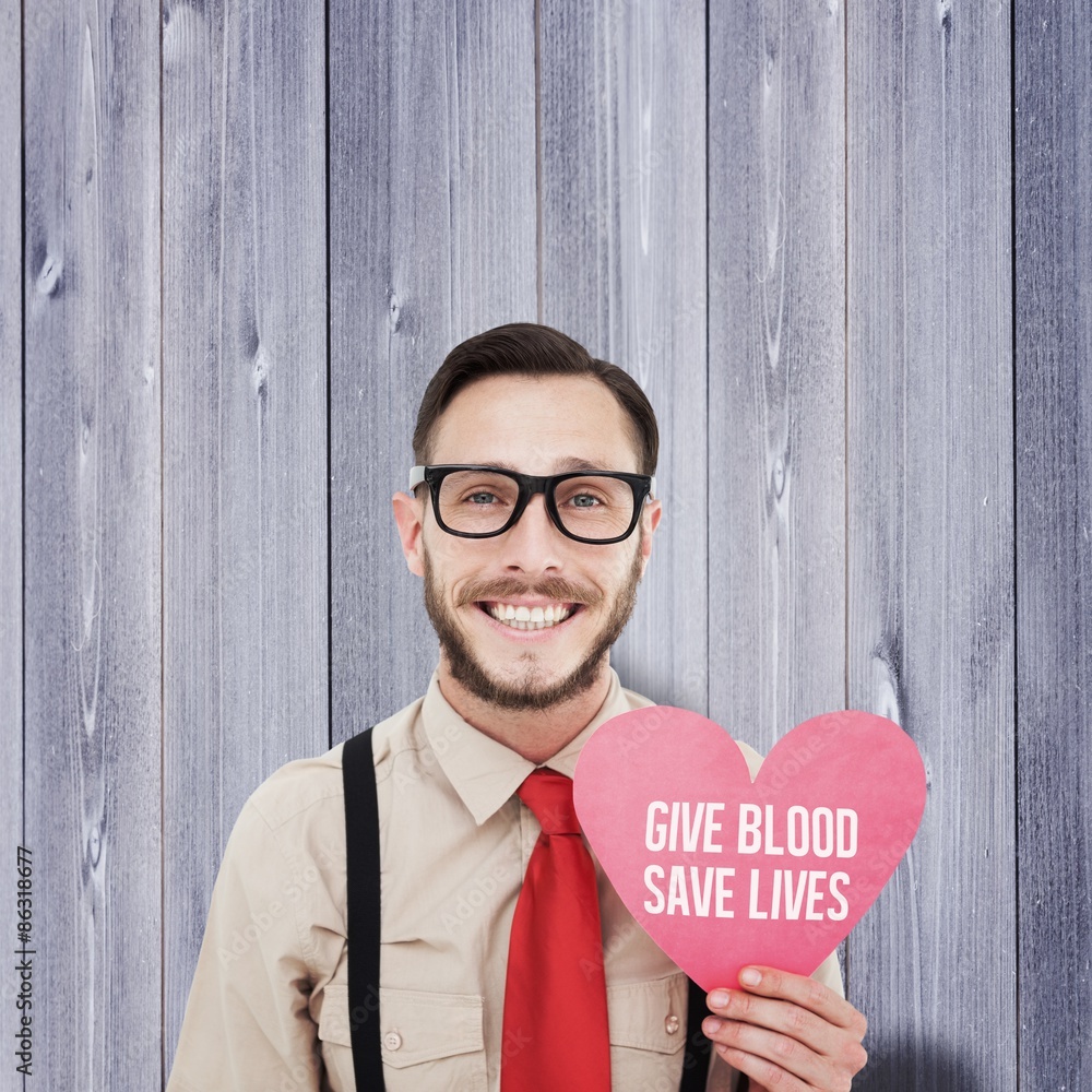 Aufkleber composite image of geeky hipster smiling and holding heart card