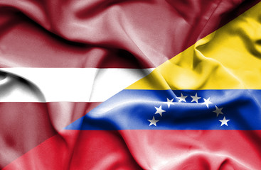 Waving flag of Venezuela and Latvia