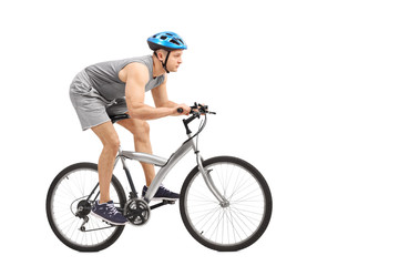 Naklejka premium Young male biker riding a gray bicycle