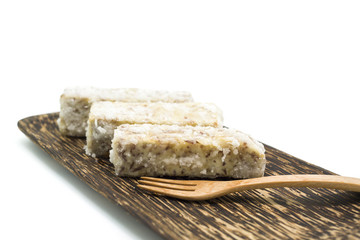 Chinese and Thai dessert of sweet taro fried on palm wood dish