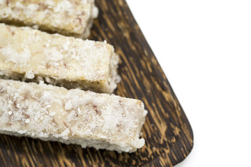 Chinese and Thai dessert of sweet taro fried on palm wood dish