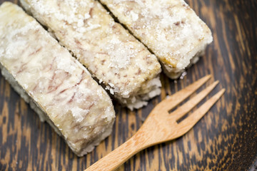 Chinese and Thai dessert of sweet taro fried on palm wood dish