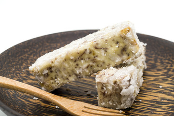 Chinese and Thai dessert of sweet taro fried on palm wood dish