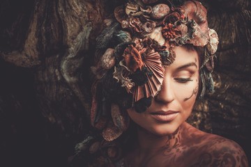 Nymph woman in a magical forest