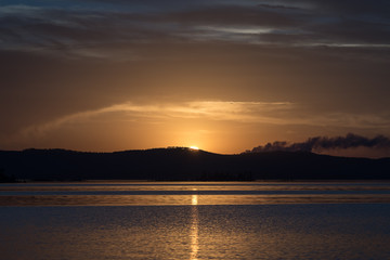 sunset at coast of the lake