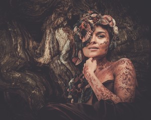 Nymph woman in a magical forest
