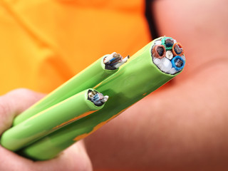 Green Nylon jacketed fiber optic cables with 576, 144 and 72 fibres as used for the National Broadband Network in Australia, a fast internet rollout covering 90% of Australia.