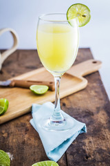 Lime Juice on wooden background