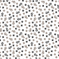 Seamless texture with cartoons cute paws and bows