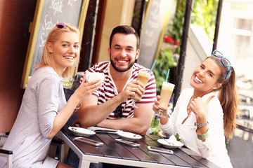 Group of friends in a cafe
