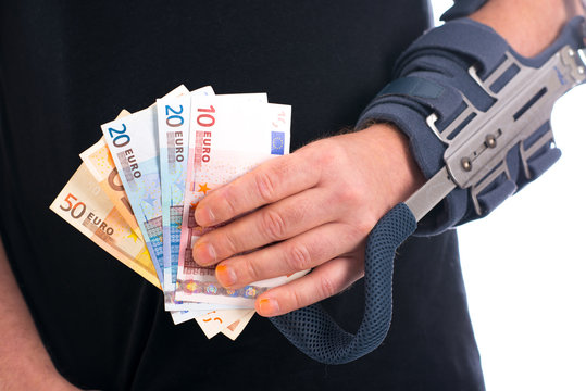 man with broken arm and euros