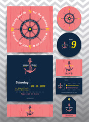 Nautical wedding invitation and RSVP card in anchor rope design template set on pink wood background
