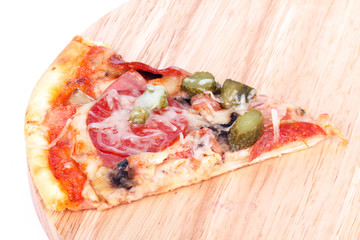 Pizza on wooden board