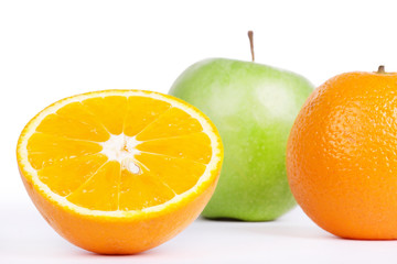 Oranges and green apple