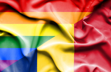 Waving flag of Romania and Pride