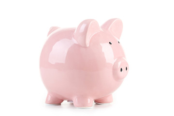 Pink piggy bank isolated on a white