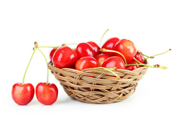 Ripe cherry in basket isolated on white
