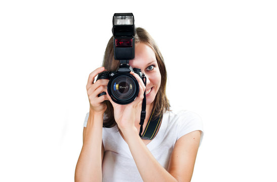 Teenage girl with her digital camera isolated on white background