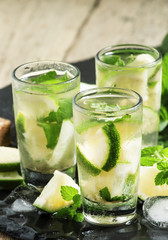 Traditional Brazilian caipirinha alcoholic cocktail with lime, m