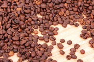 Coffee beans on wooden table